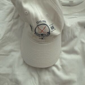 White Baseball Cap and shirt from celebrity xcel cruise maiden cruise